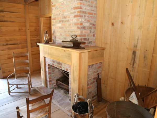 a wooden chair in a room