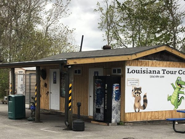 a group of people standing in front of a house